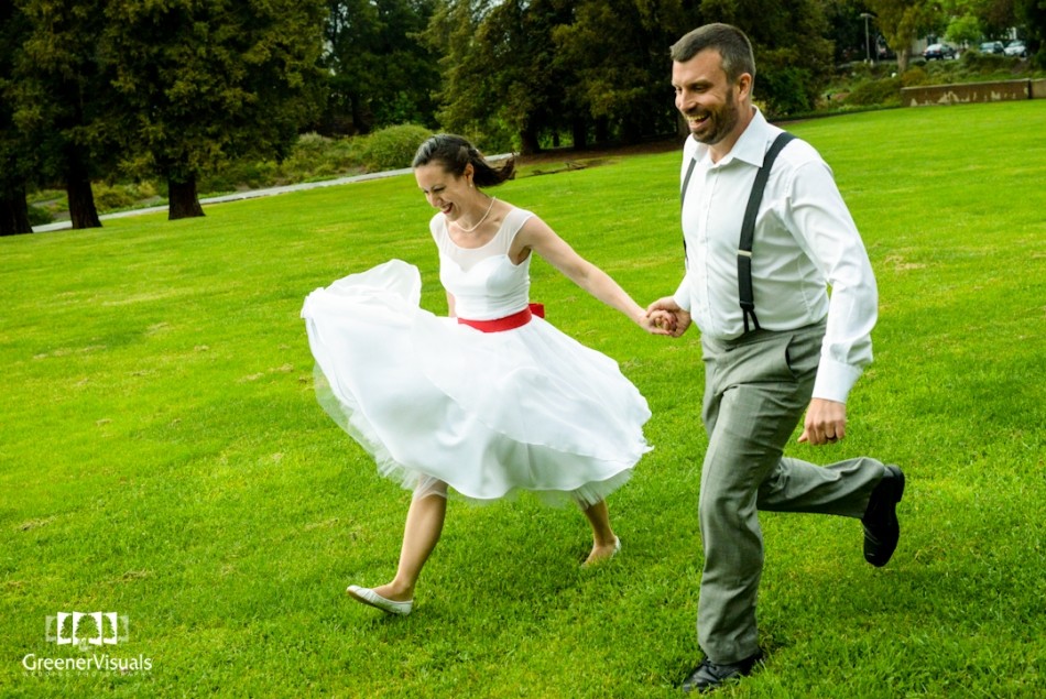 wedding-couple-skipping-through-green-field-Best-of-2014-Wedding