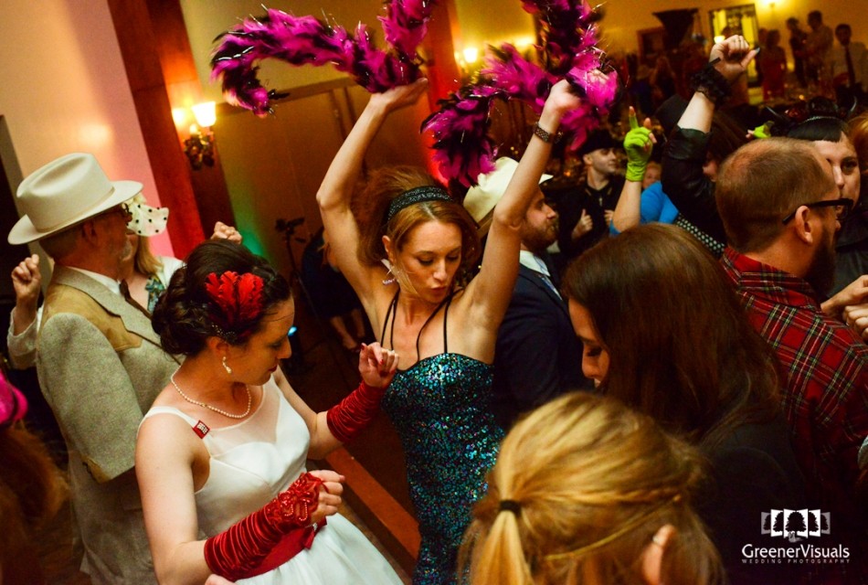 sister-of-bride-dances-with-feathered-boa-Best-of-2014-Wedding