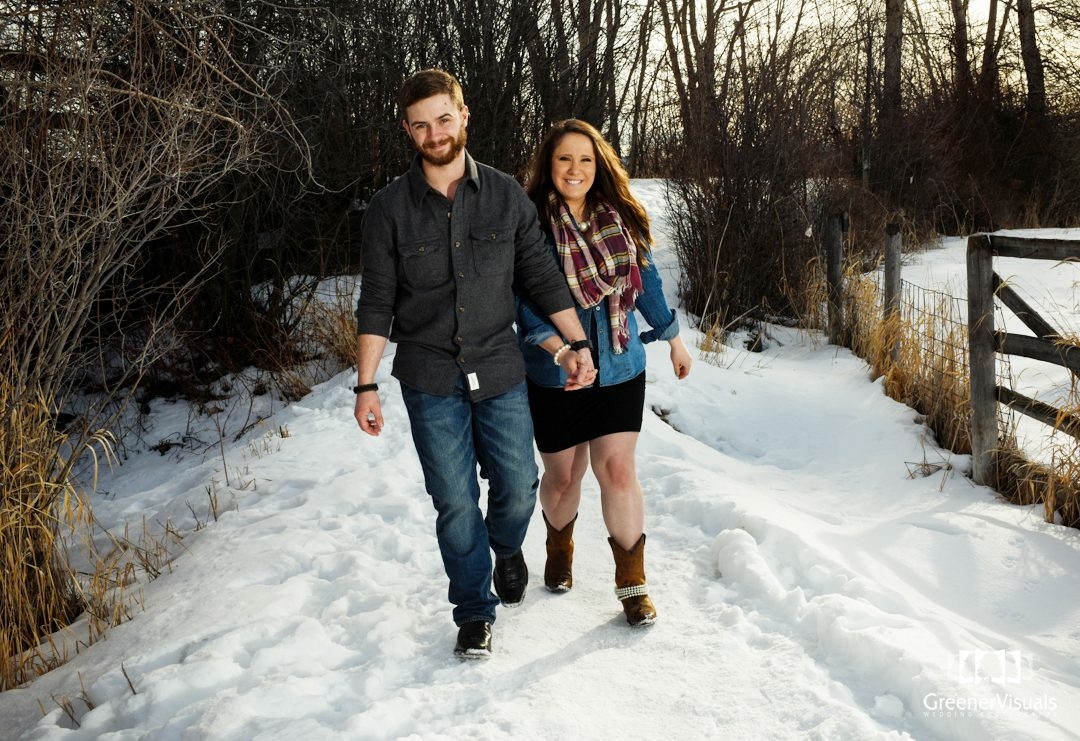couple-on-snowy-trail-at-Story-Mill-Park-Winter-Engagement-Portrait