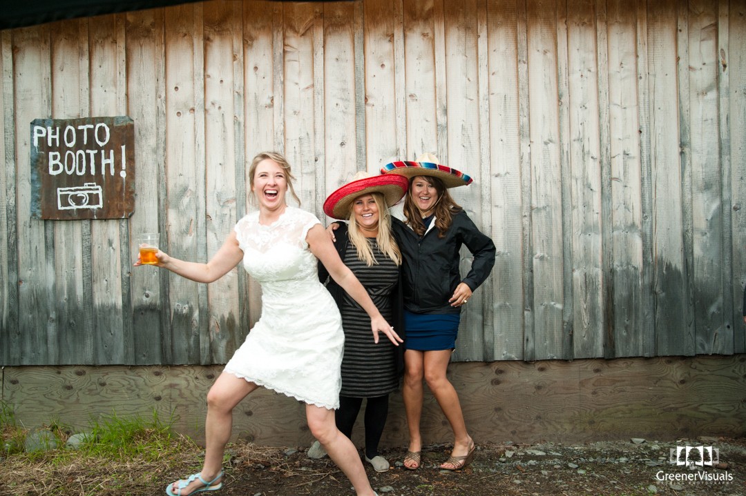bride-plays-with-guests-in-Alaska-Wedding-Photo-Booth