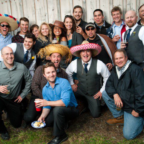 groom-with-wedding-guests-in-Alaska-Wedding-Photo-Booth