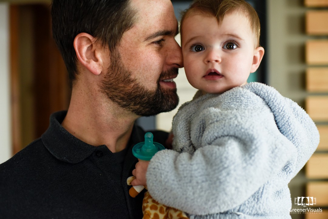 father-snuggles-with-baby-daughter-during-toddler-Fall-Family-Portraits