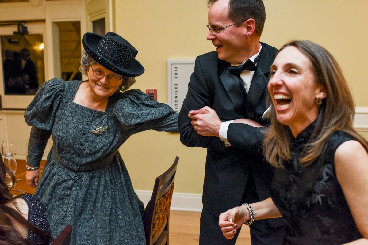 guests-laughing-during-Lake-Yellowstone-Hotel-125th-anniversary-gala-reception