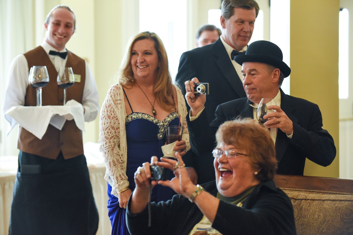 guests-taking-pictures-during-Lake-Yellowstone-Hotel-125th-anniversary-gala