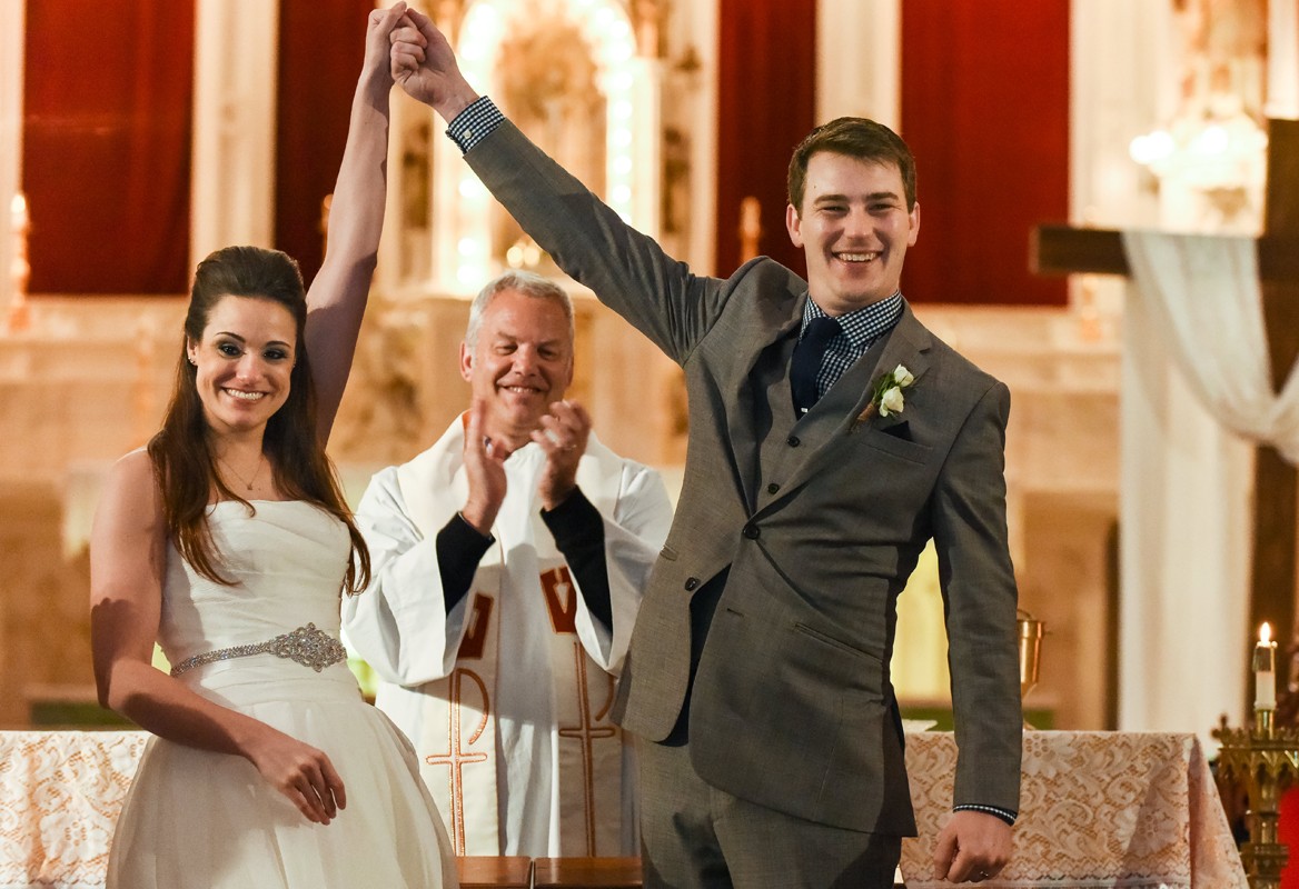 celebration-at-the-alter-church-of-the-holy-family-wedding-ceremony