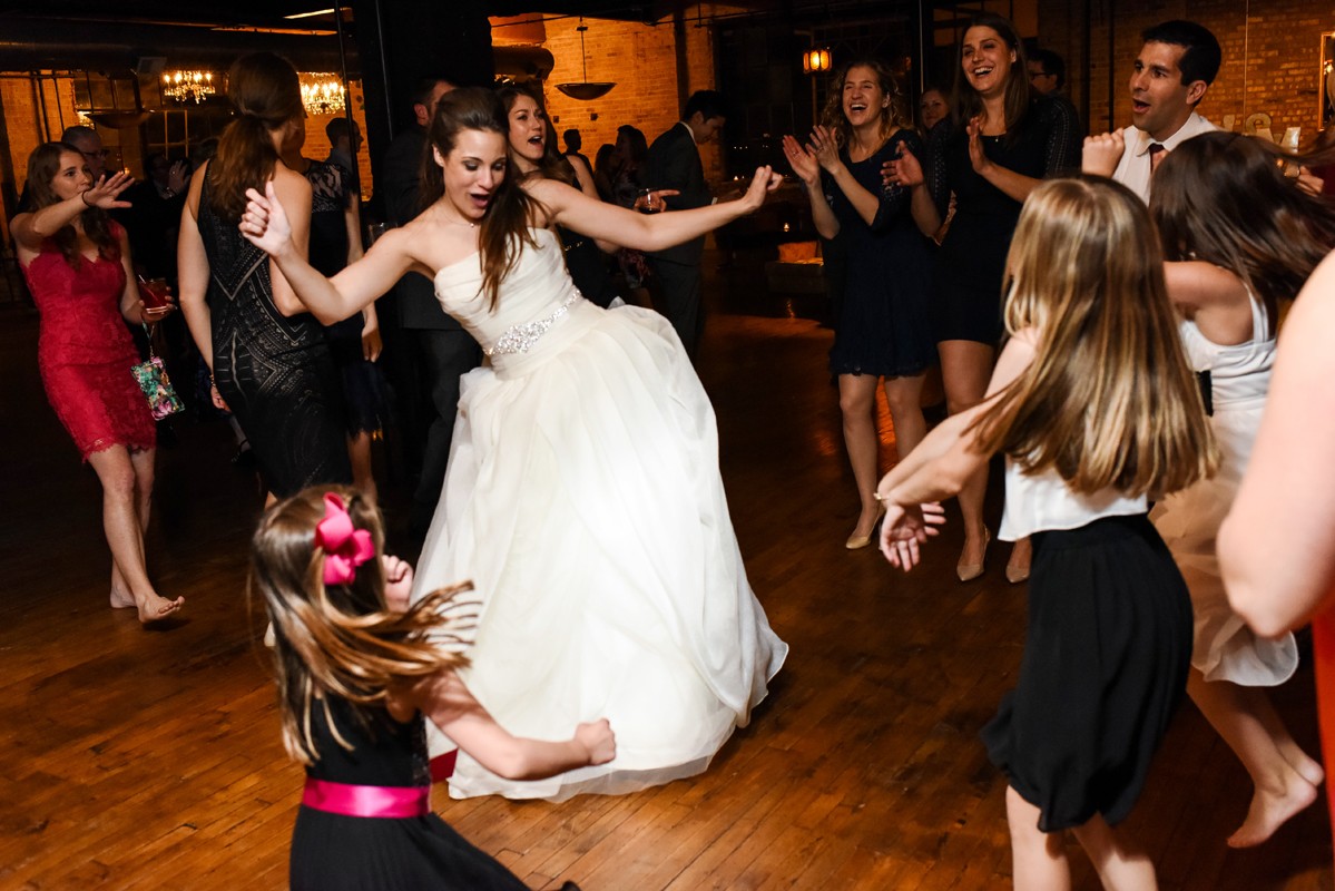 bride-dances-with-kids-during-Chicago-Salvage-One-Wedding