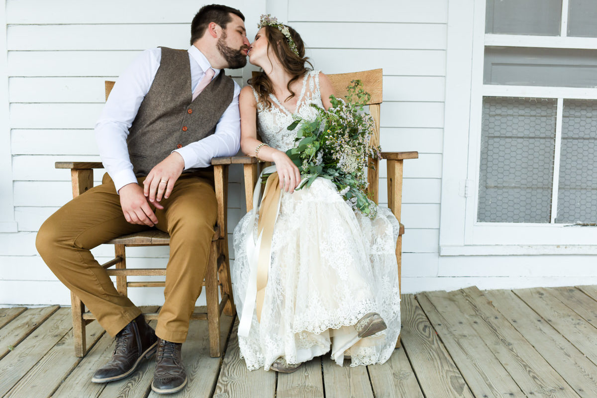 Virginia City Wedding couple porch kiss
