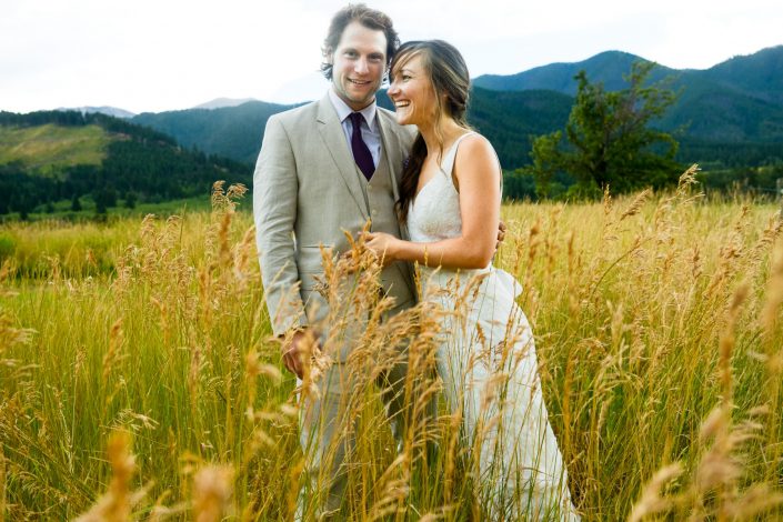 Montana Wedding Photographer Springhill Pavilion bride and groom laughing