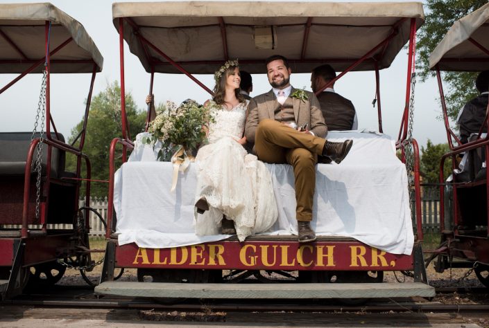 Montana Wedding Photographer Virginia City bridal party train ride