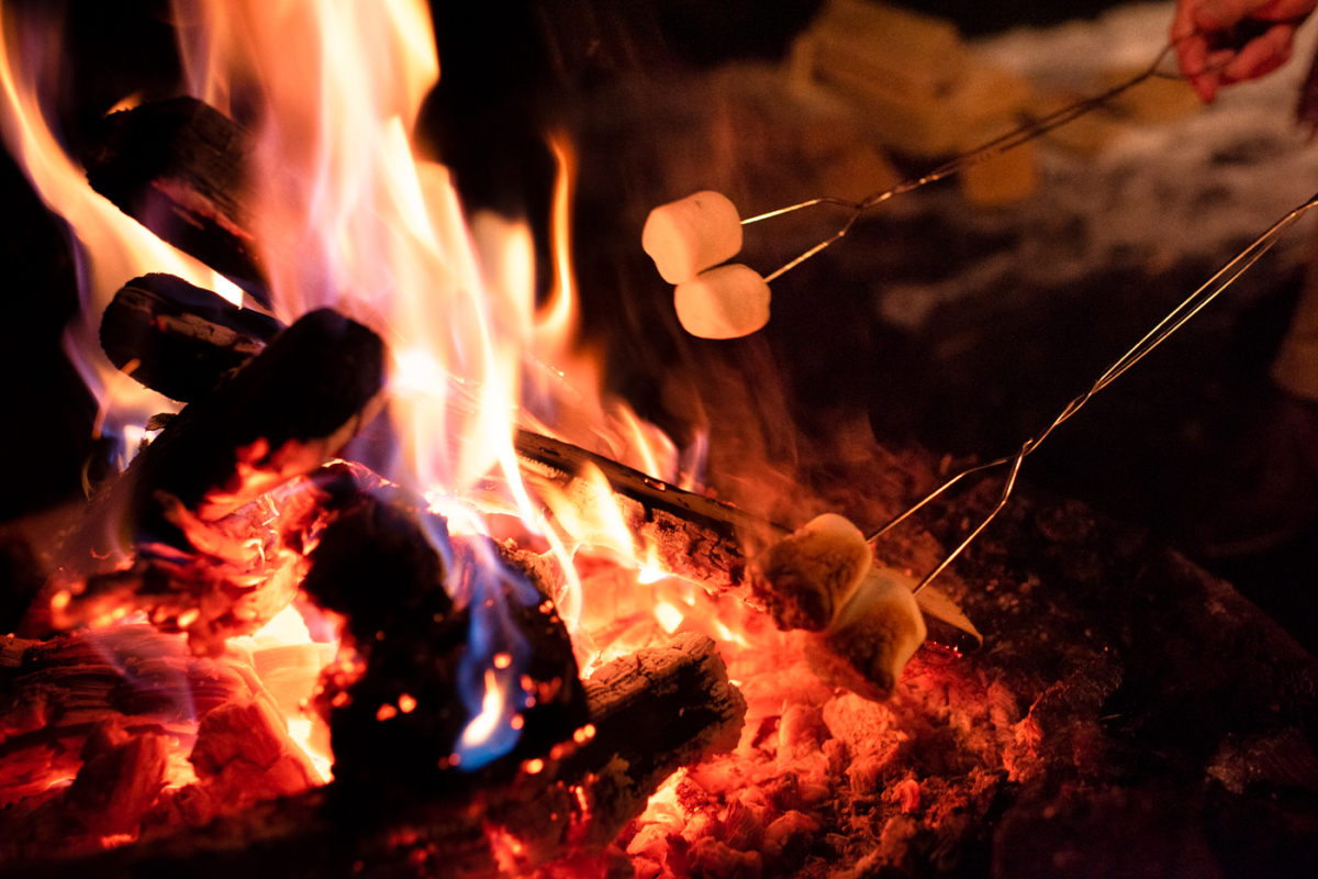smores-on-stick-cooking-over-campfire