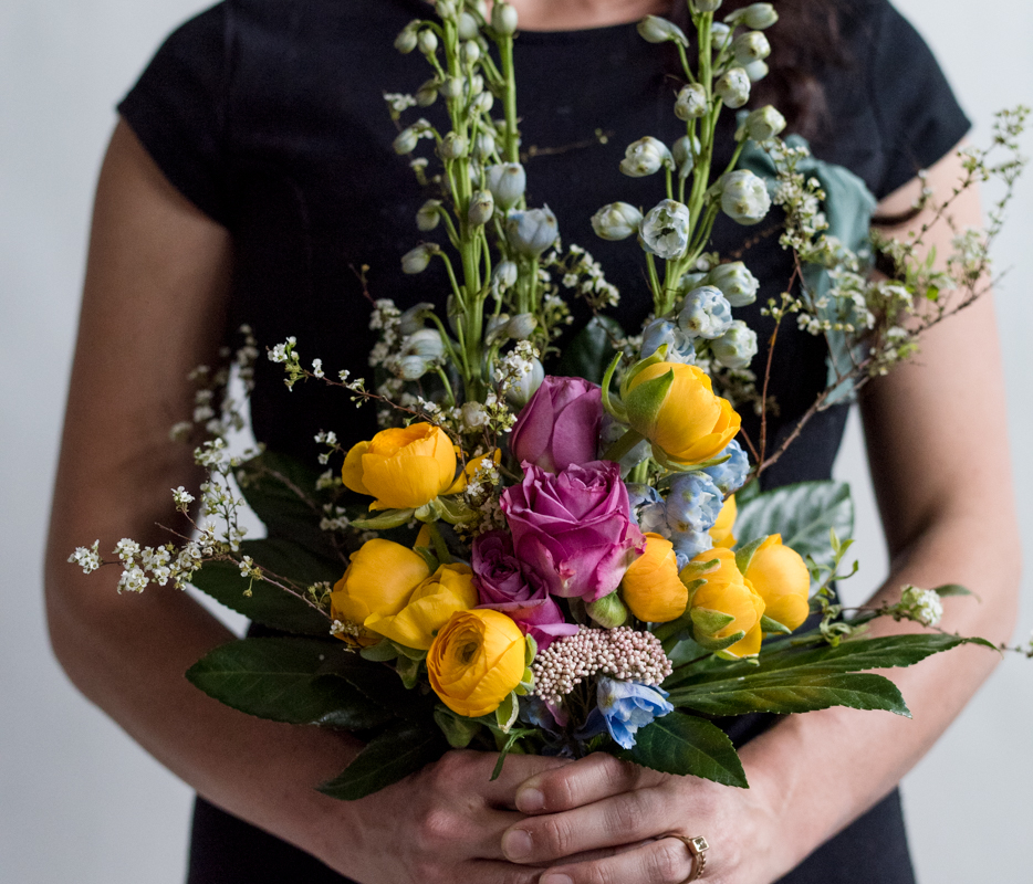 sue-of-Wild-Blume-Floral-Design-holding-bouquet