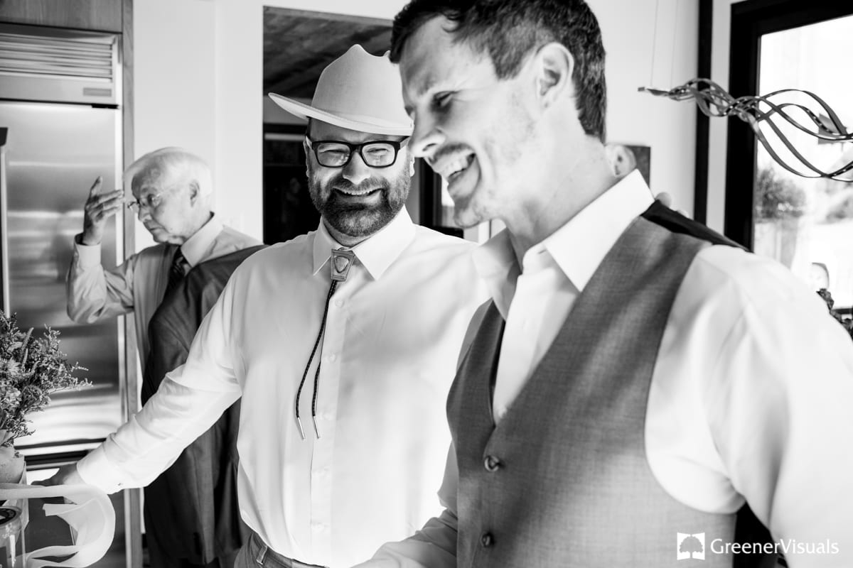groom-getting-ready-laughs-with-friends-during-Countryside-Bozeman-Montana-Wedding