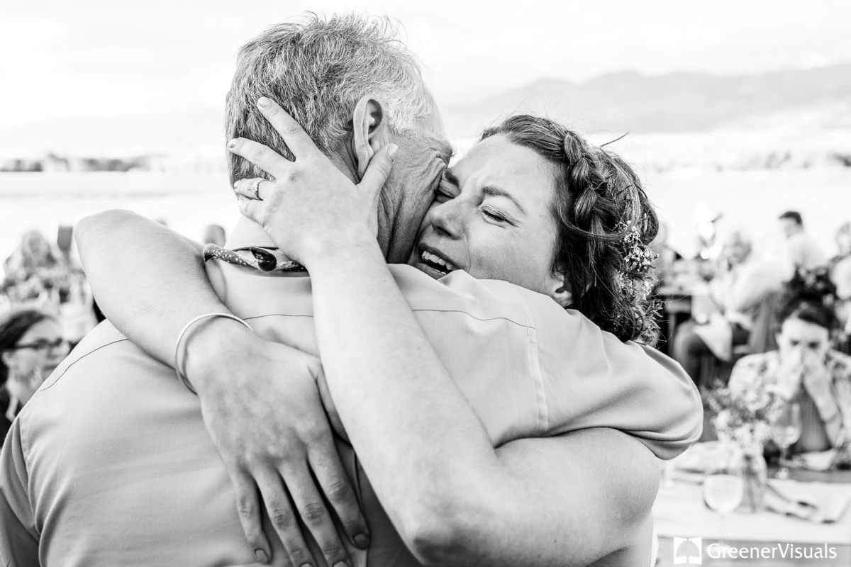 bride-cries-tears-of-joy-while-hugging-father-Countryside-Bozeman-Montana-Wedding