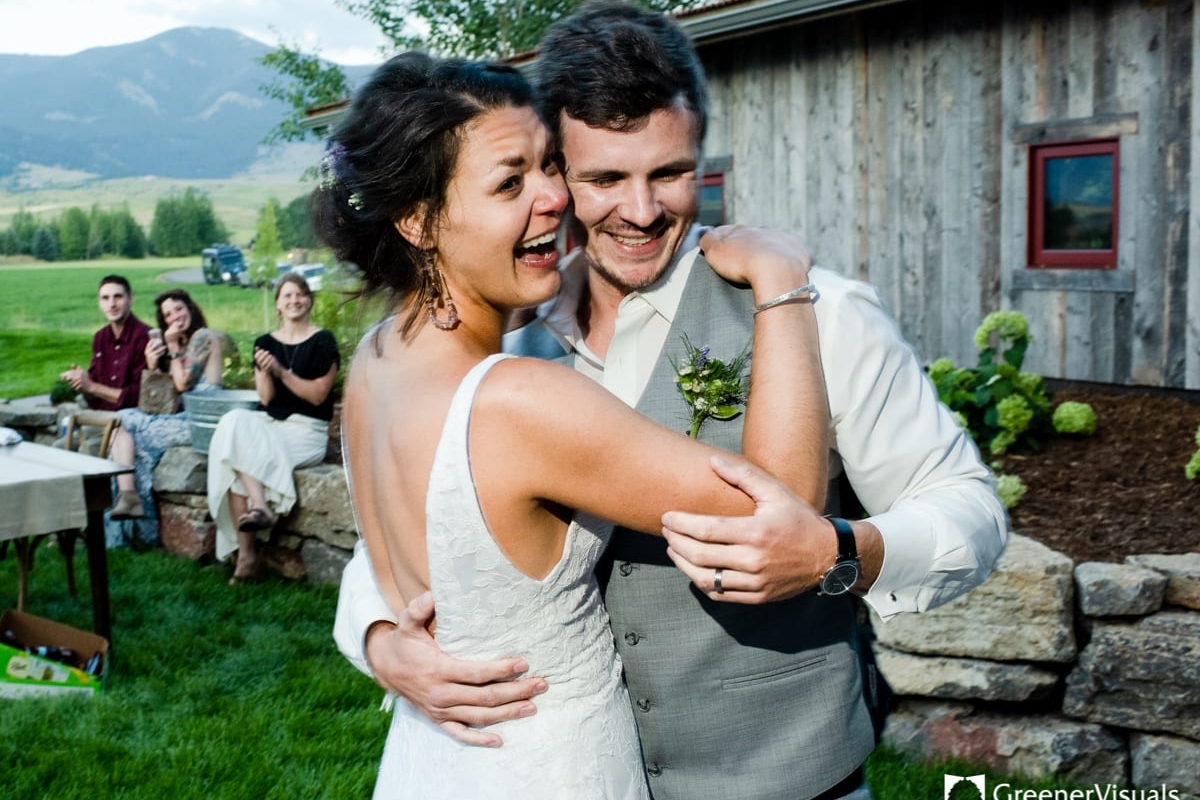 wedding-couple-embrace-during-Countryside-Bozeman-Montana-Wedding