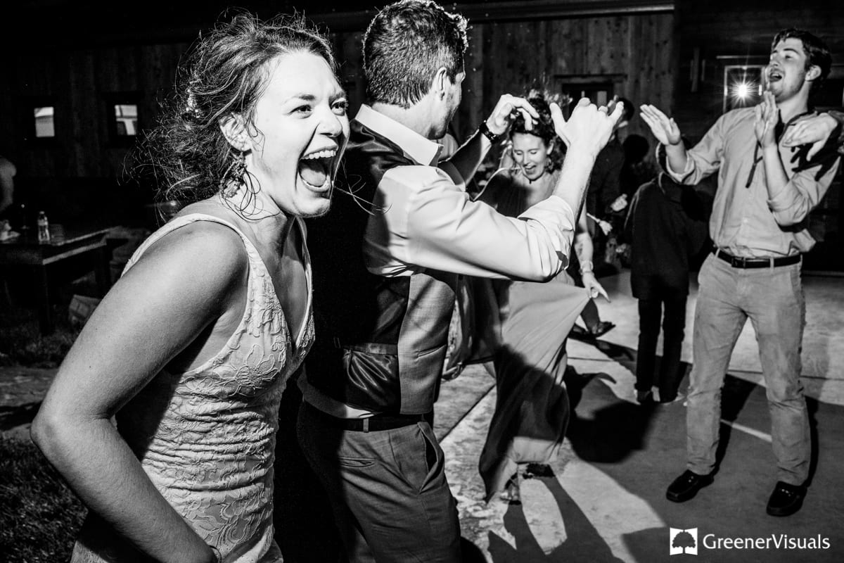 excited-bride-smiles-on-dancefloor-Countryside-Bozeman-Montana-Wedding