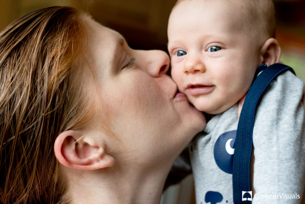 new-mother-gives-baby-kisses-Anchorage-Alaska-Destination-Family-Portrait-Photographer