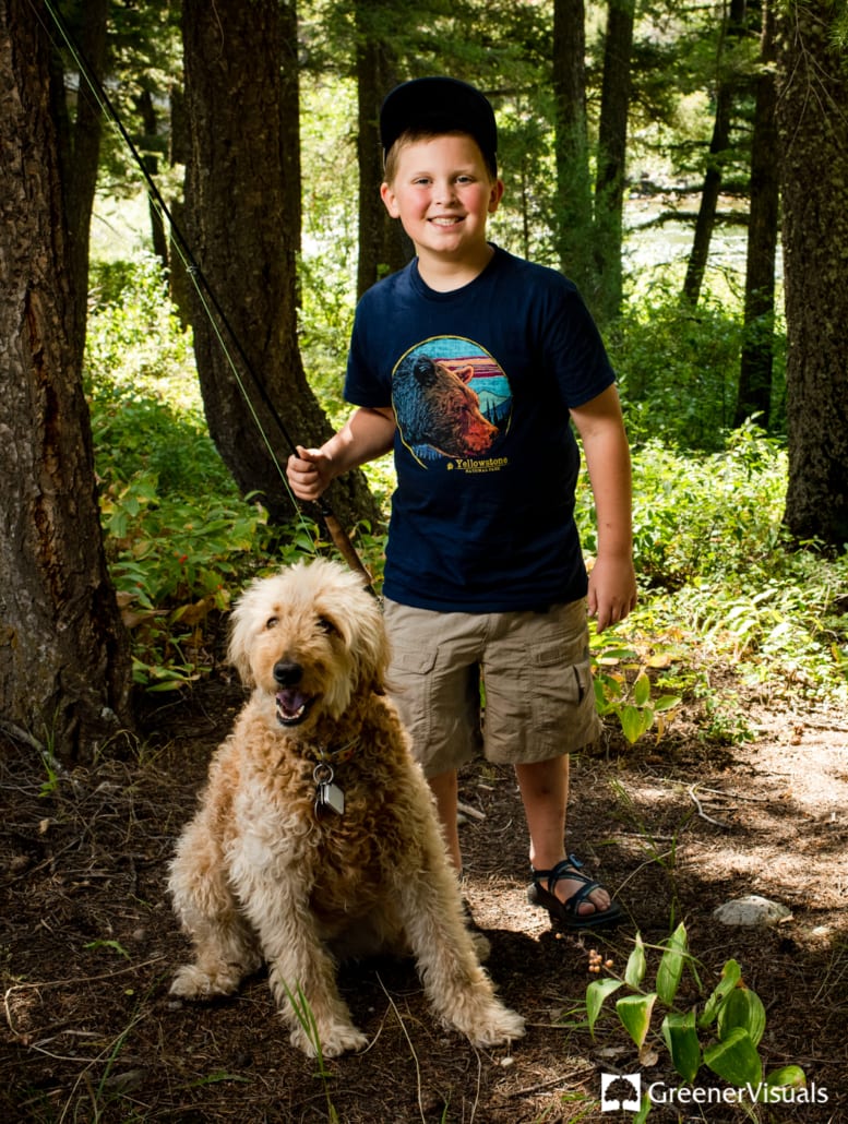 grandson-with-flyrod-and-family-golden-doodle
