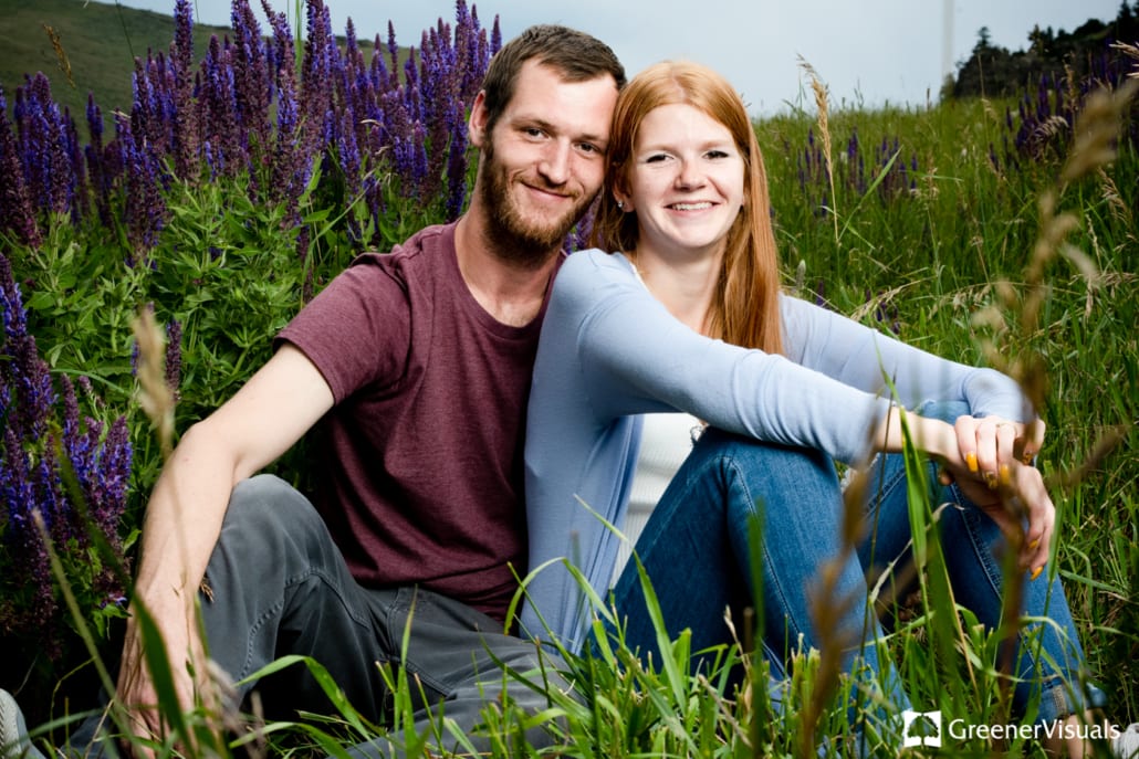 engaged-couple-sits-in-wild-purple-lupin-flower-patch-during-their-Livingston-Montana-Engagement-Portraits 