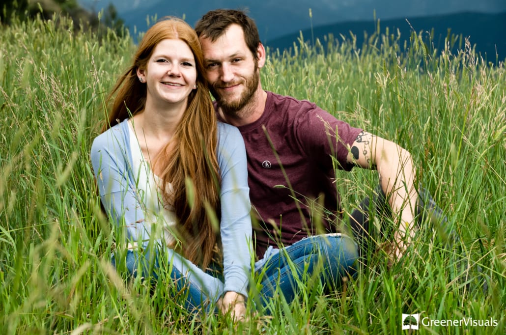 engaged-couple-embrace-in-tall-grass-during-their-Livingston-Montana-Engagement-Portraits 