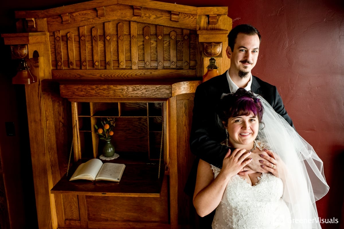 couple-in-window-light-near-oak-desk-2019-Best-of-Wedding-Photography