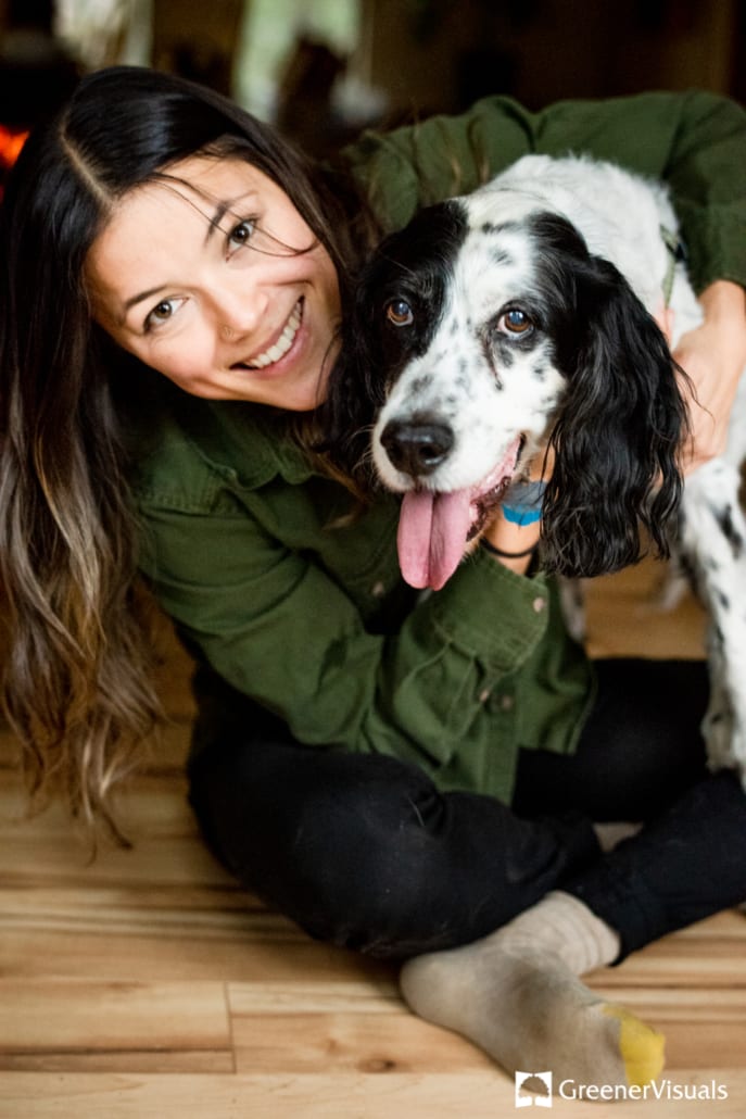 woman-smiling-with-her-old-dog