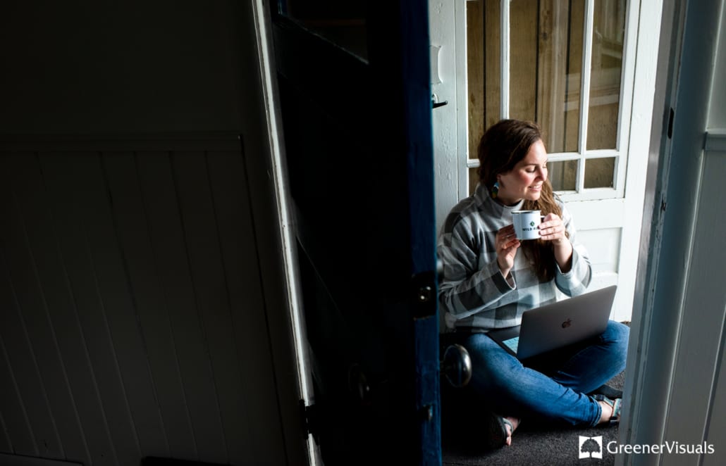 Katie-Smith-in-blue-doorway-environmental-business-portrait