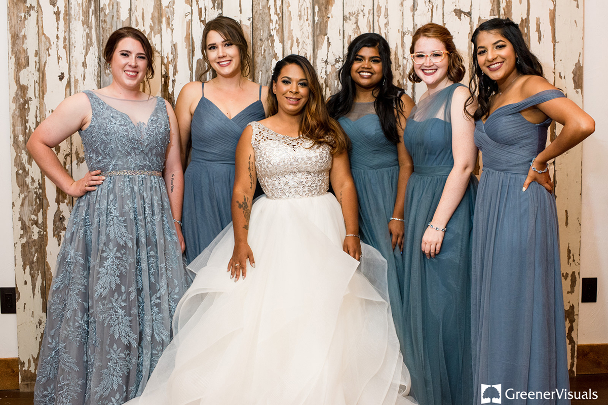 bride-with-bridesmaids-in-blue-dresses