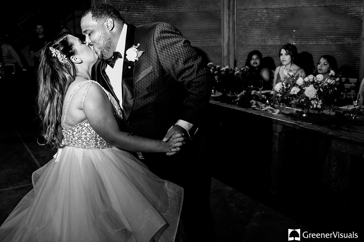 bride-and-groom-kiss-on-dancefloor
