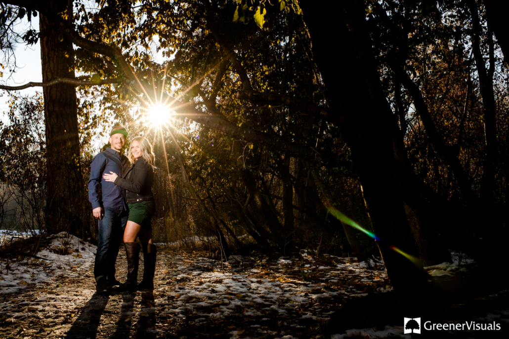 engaged-couple-walk-trails-in-Greenough-Park