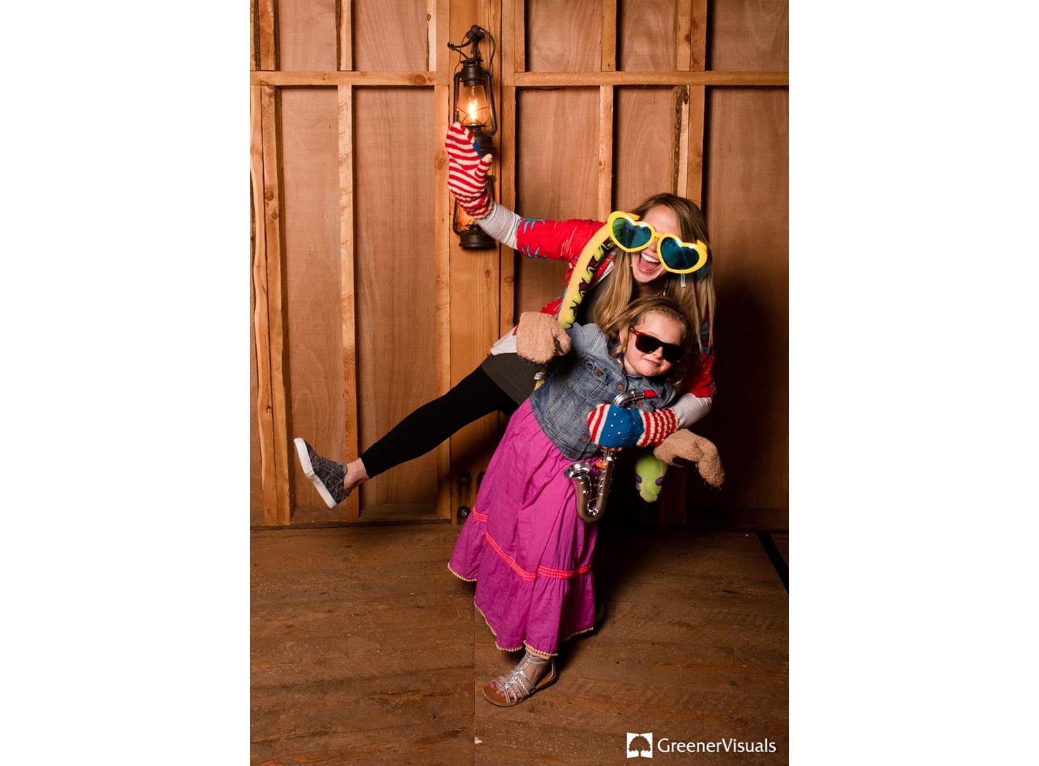 pink-dress-kid-and-adult-play-photo-booth-headwaters-ranch