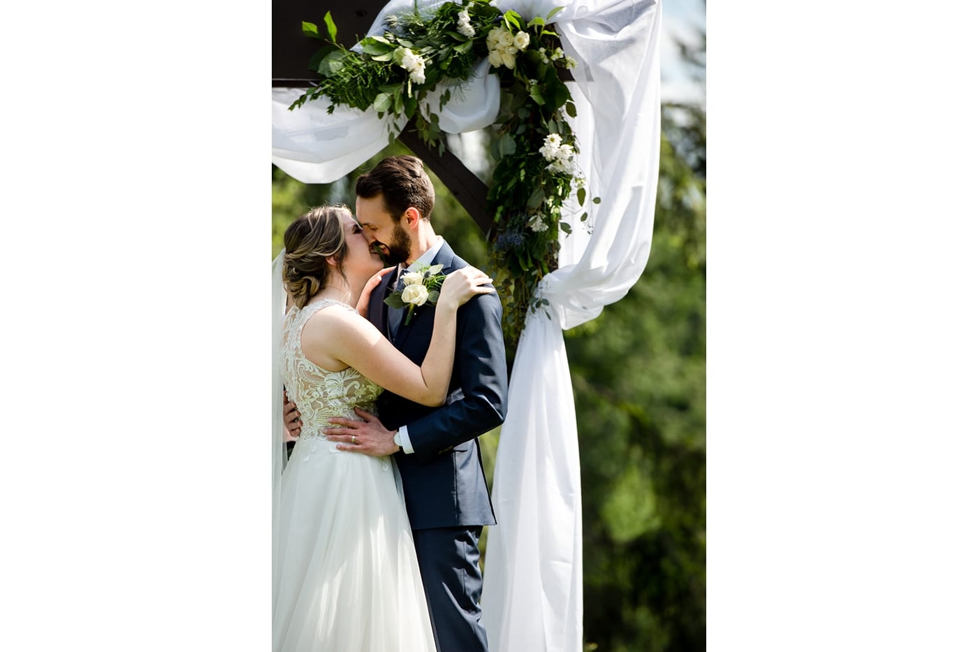 First-Kiss-Trinity-Tree-Farm-Wedding-Photos-Greener-Visuals