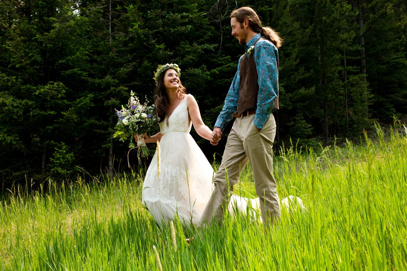 bride-groom-smiling-walking-at-maverick-mountain