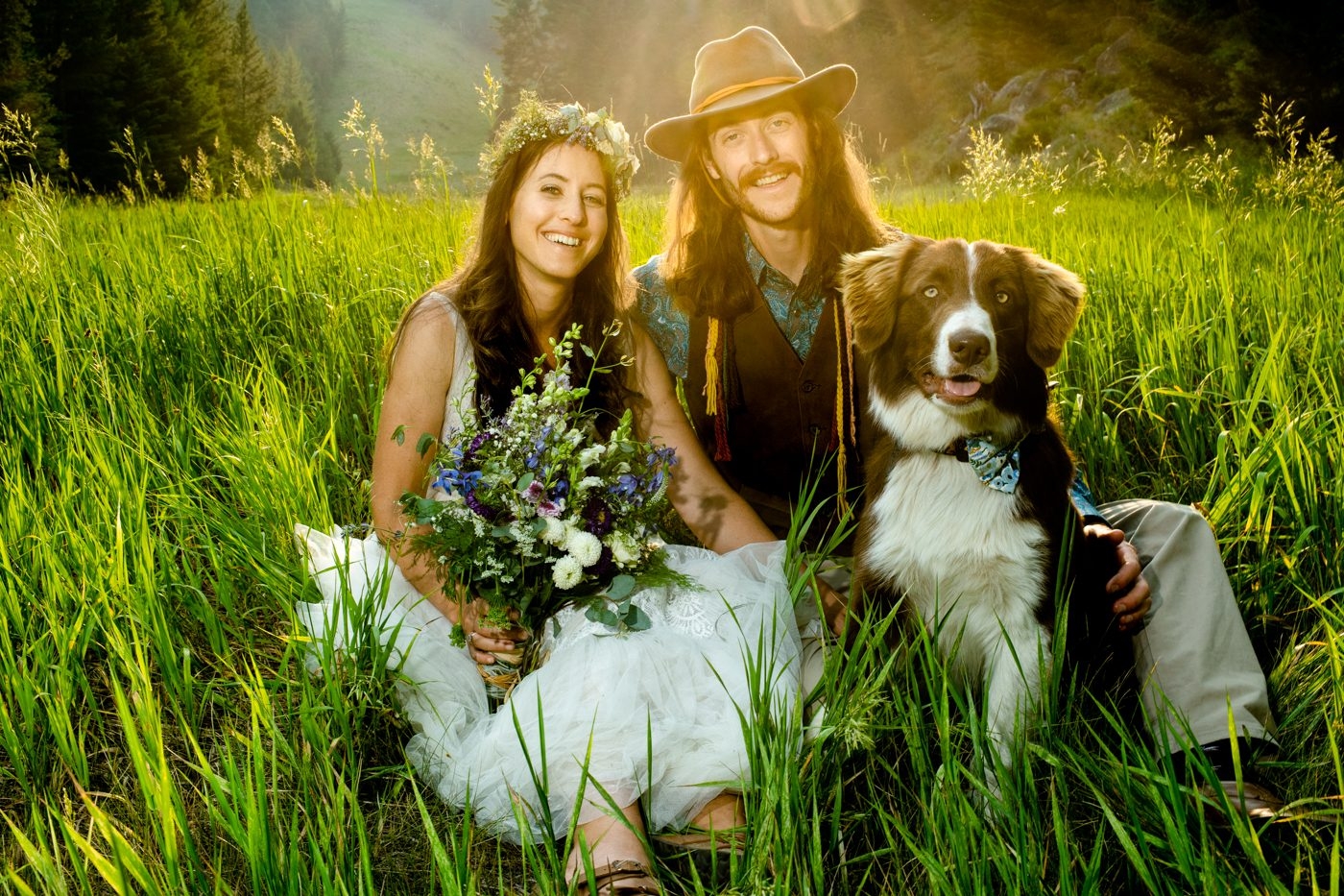 newlyweds-with-dog-smiling-maverick-mountain