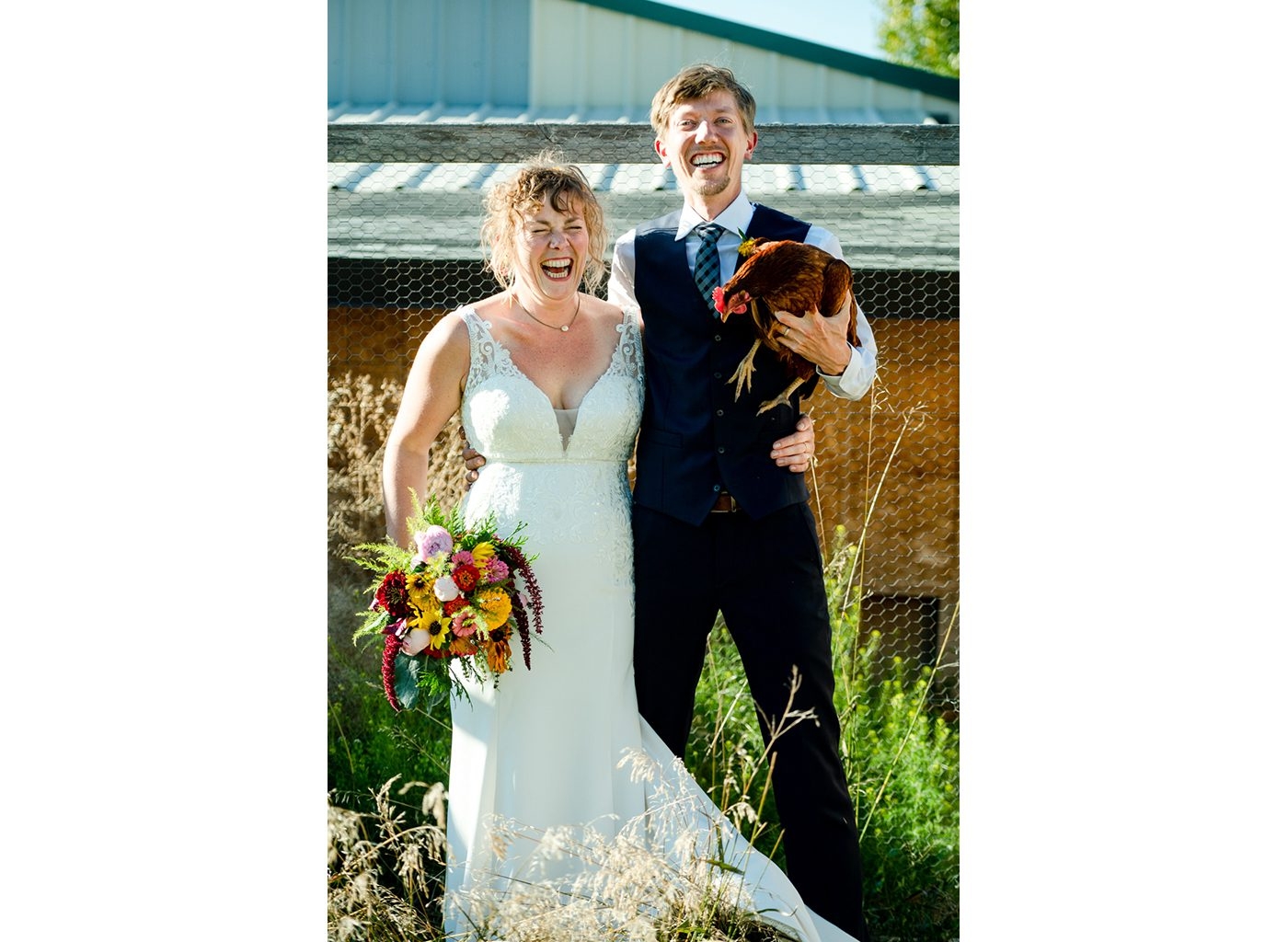 Frenchtown-Montana-Fall-Farm-Wedding-Day-couple-with-chicken