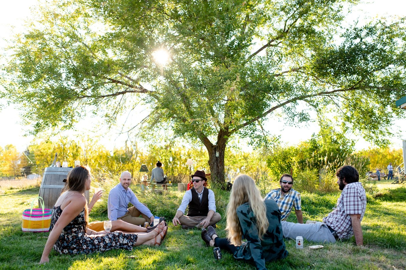 Frenchtown-Montana-Fall-Farm-Wedding-sitting-under-tree