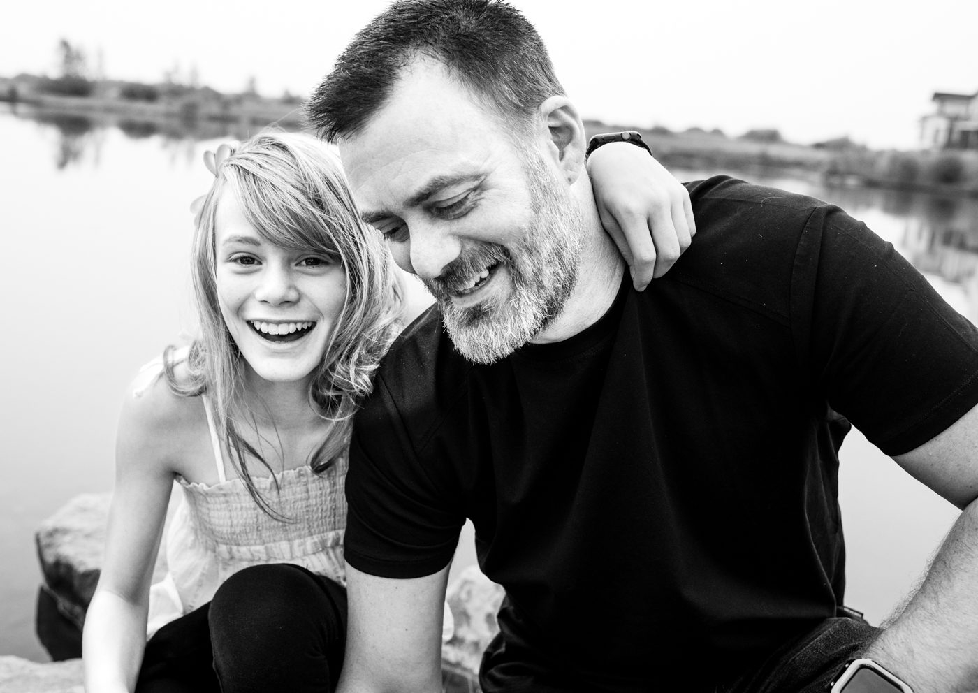 father-candid-laugh-with-young-daughter-portrait