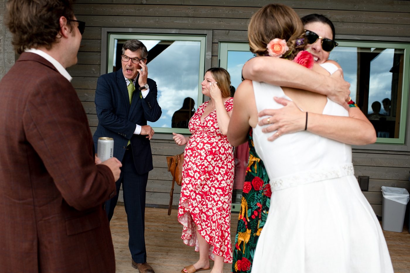 father-of-bride-cries-with-guests