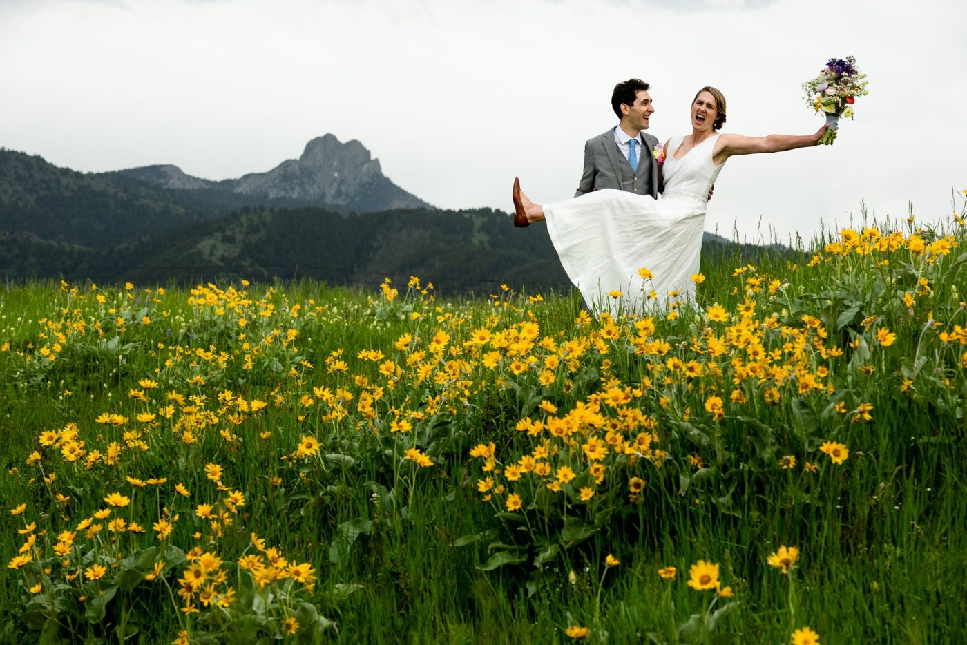 Newlyweds-in-flower-field-Ross-Peak