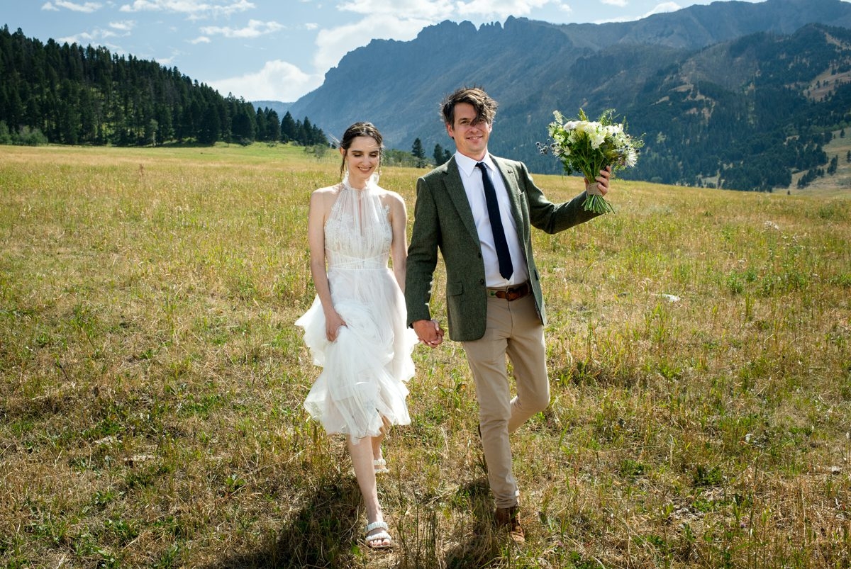 Newlyweds-Walk-Grizzly-Creek-Ranch-Wedding