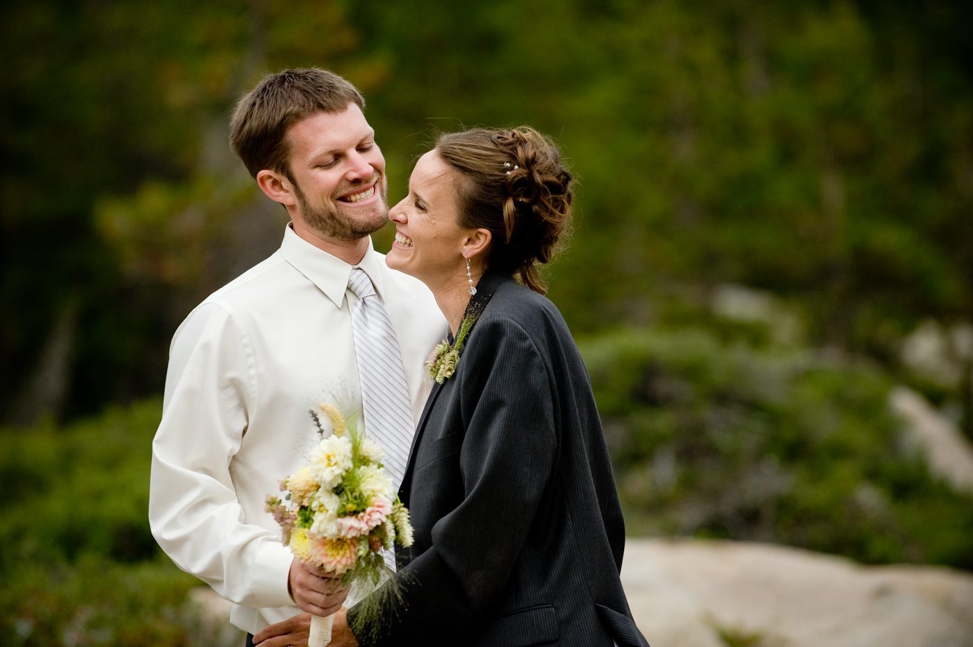 bride-smiling-with-groom-at-The-HideOut-in-Kirkwood-California