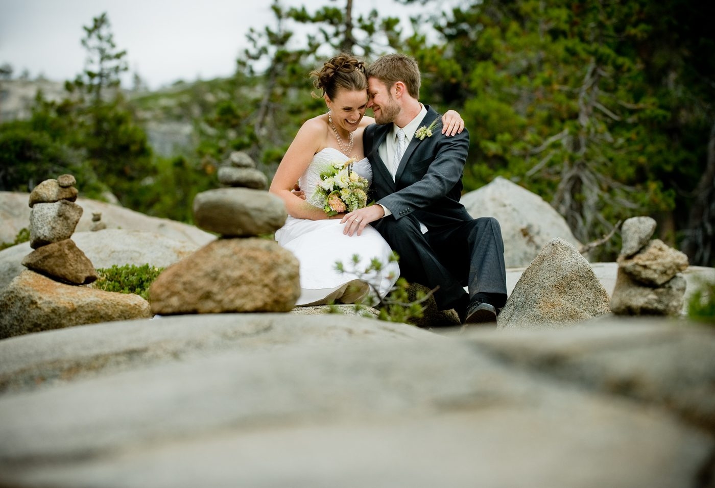 Wedding-couple-embrace-at-The-HideOut-in-Kirkwood-California