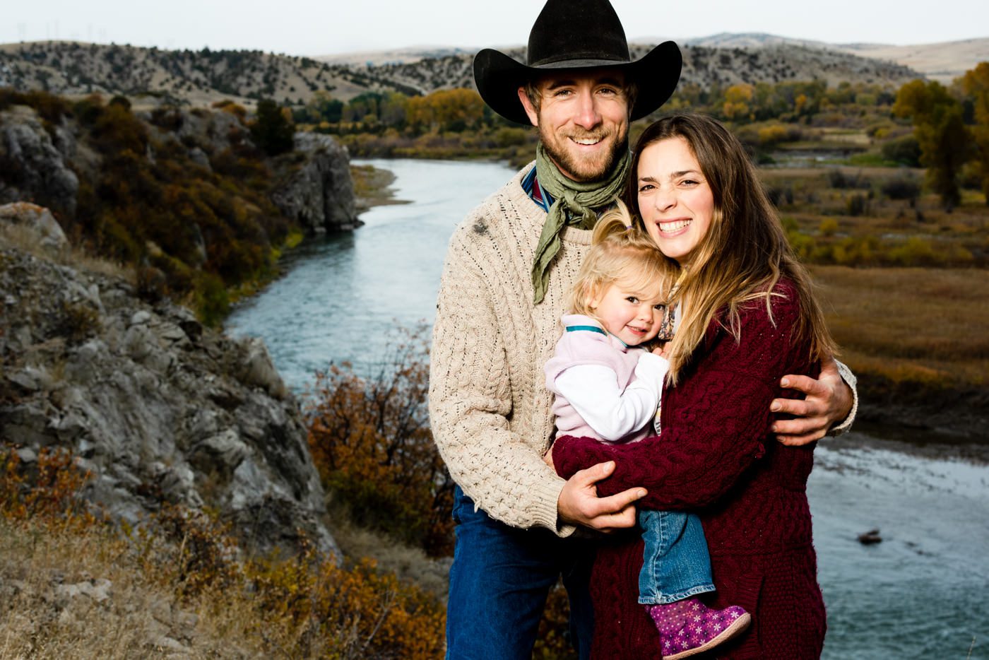 Parents-hugging-daughter-at-Missouri-River-Breaks-Montana-Family-Portrait-Photographer