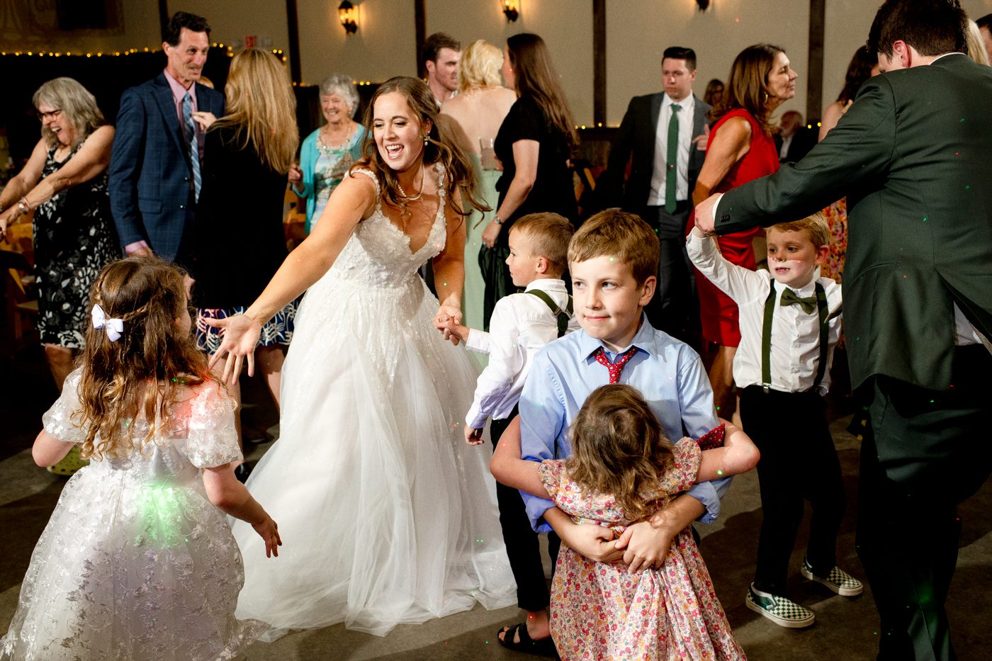 bride-dancing-with-kids-at-wedding-reception-The-Woodlands-at-Cottonwood-Canyon