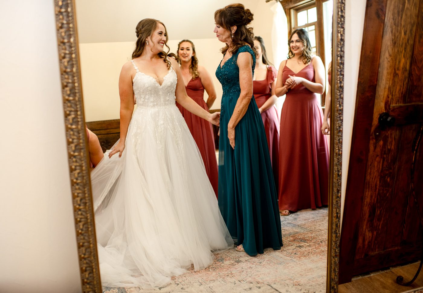 bride-gets-into-wedding-dress-The-Woodlands-at-Cottonwood-Canyon