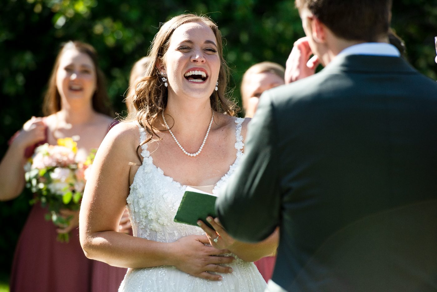 bride-laughing-at-alter-with-groom-The-Woodlands-at-Cottonwood-Canyon