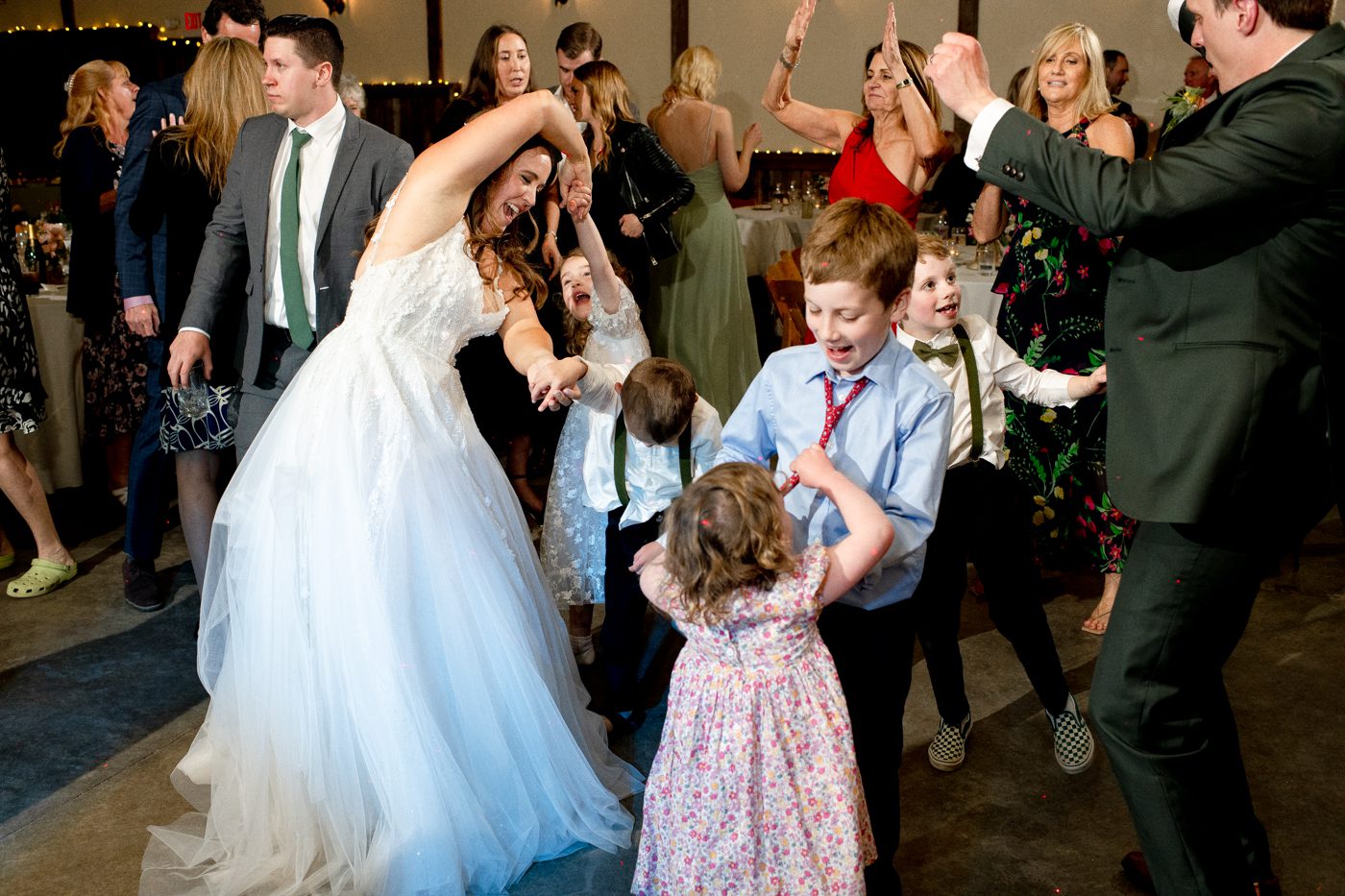 bride-twirl-dancing-with-kids-at-wedding-reception-The-Woodlands-at-Cottonwood-Canyon