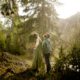engaged-couple-smile-at-rain-during-Montana-Ruby-Valley-Rainstorm-Engagement-session