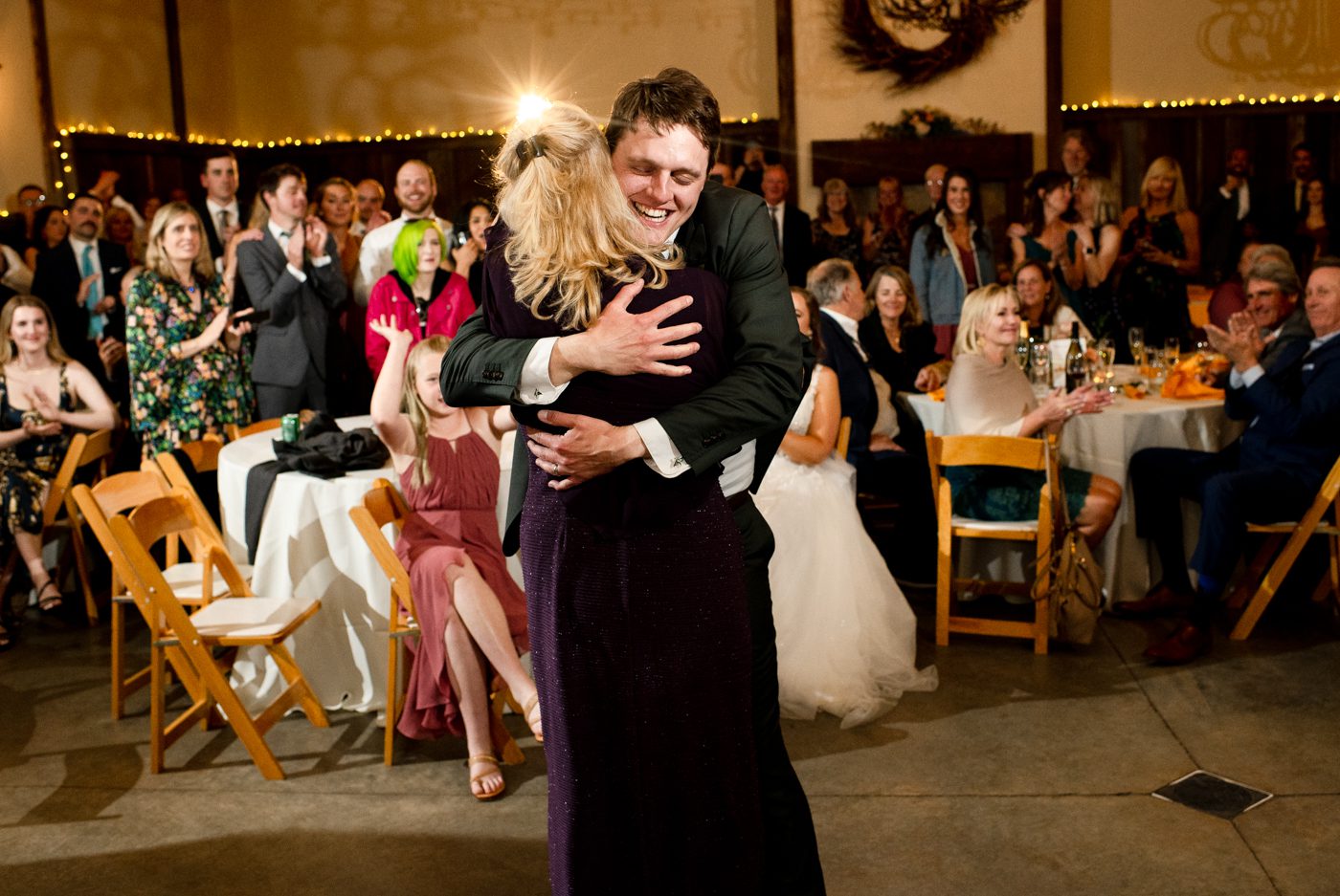 groom-hugs-mother-during-dance-The-Woodlands-at-Cottonwood-Canyon