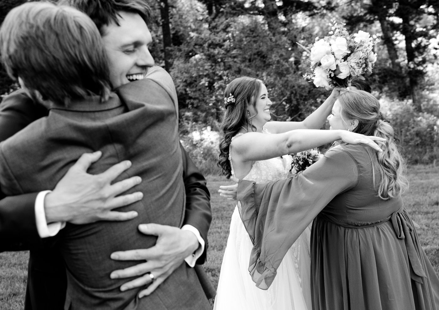 hugging-the-bride-and-groom-The-Woodlands-at-Cottonwood-Canyon