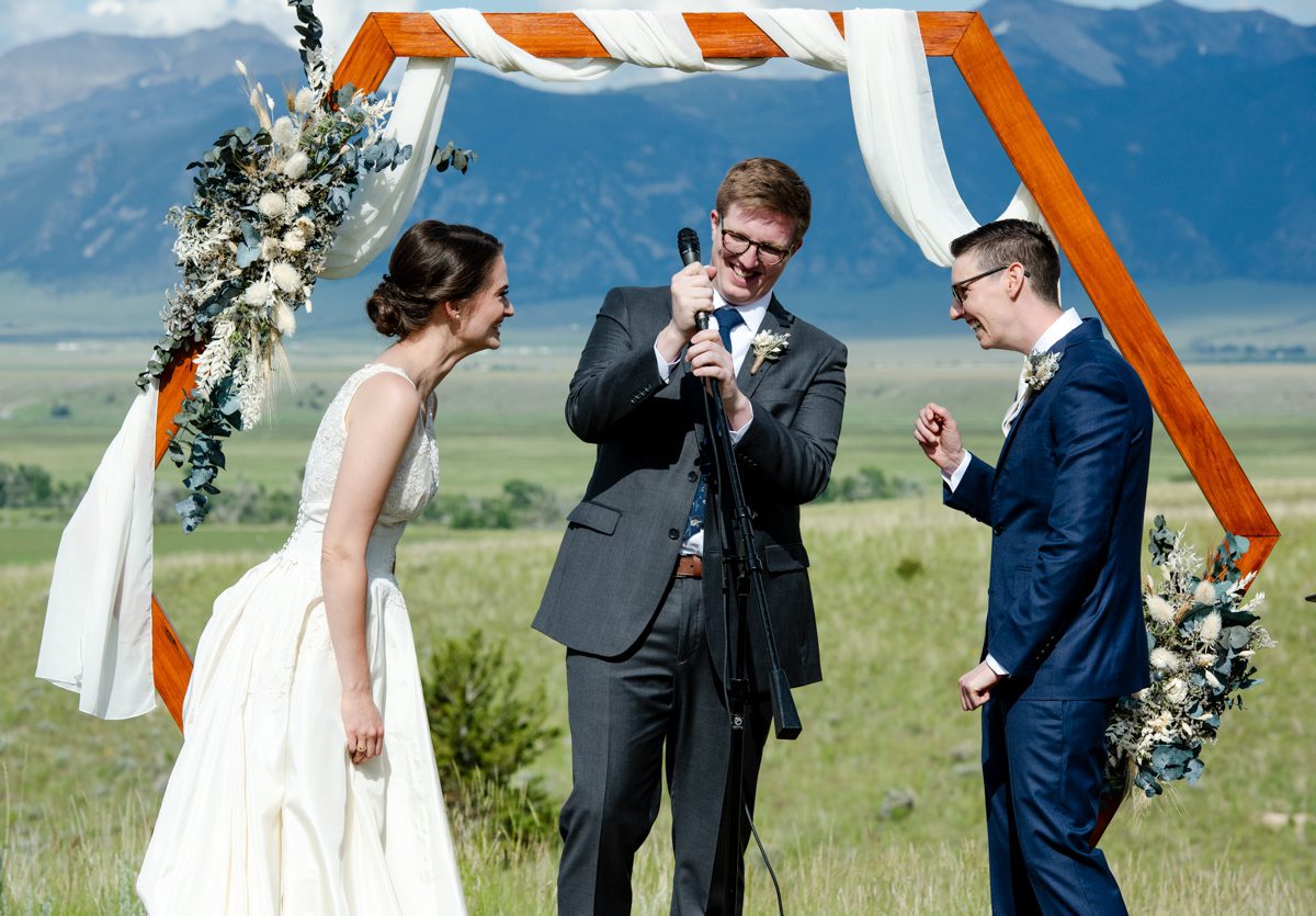 Couple-laughing-at-wedding-alter-Ennis-Montana-wedding